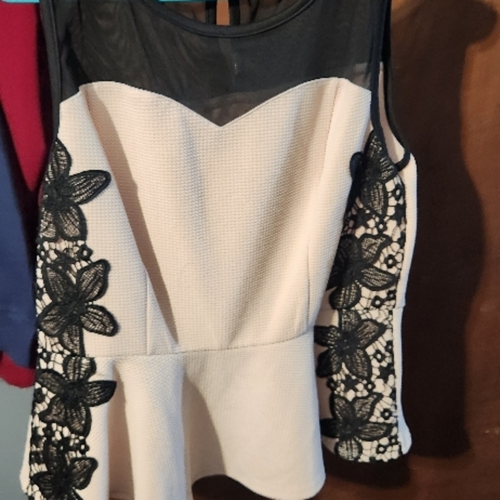 Chic Black and White Lace Peplum Top brand is Thalia sodi